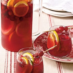 pitcher and glasses filled with cranberry sangria