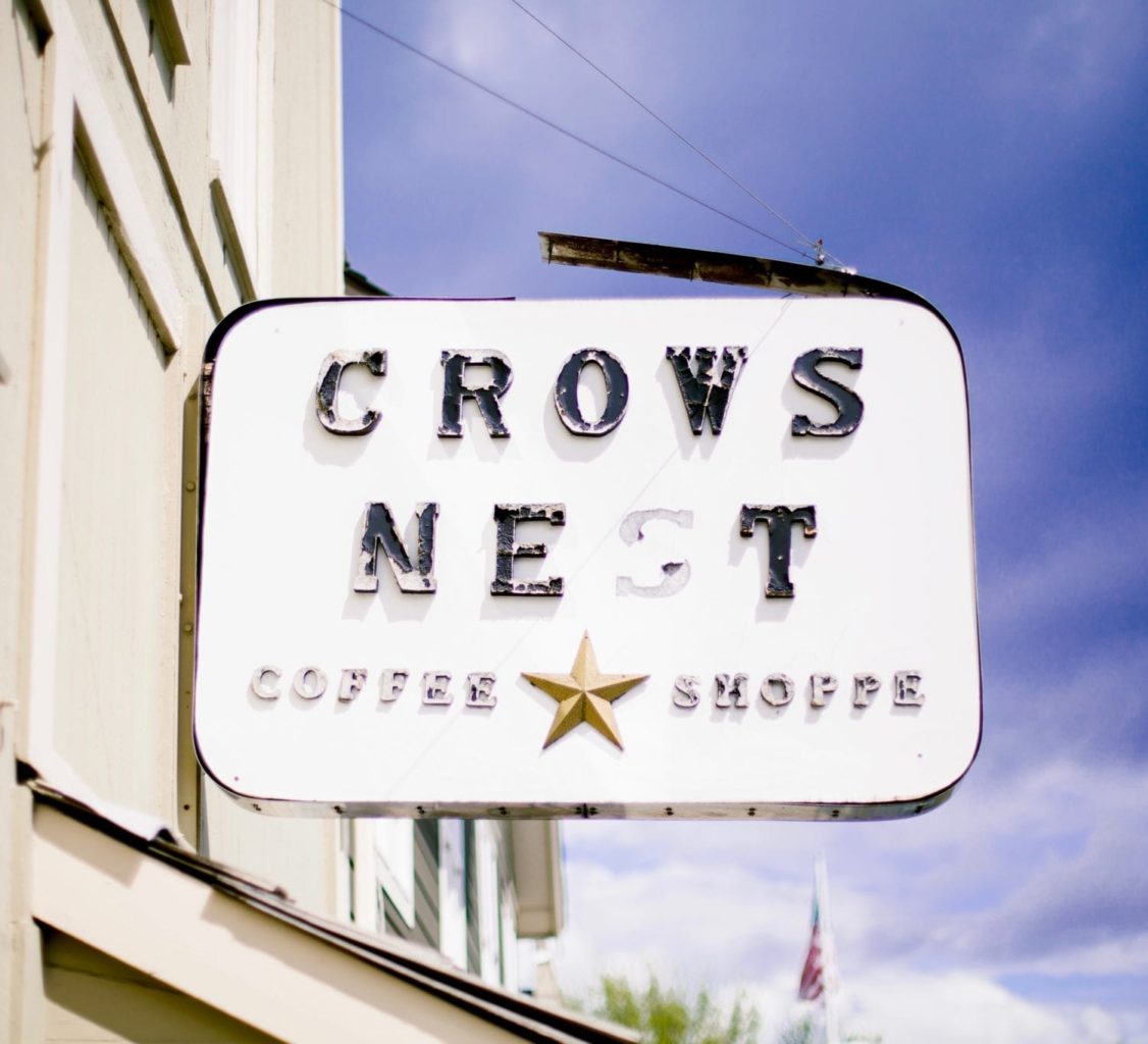 sign for crows next coffee shop