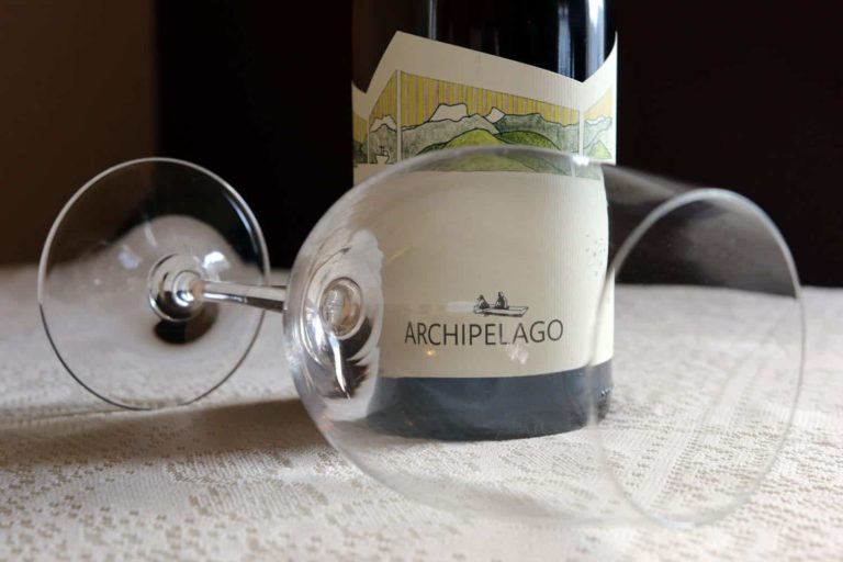 archipelago wine bottle with glass