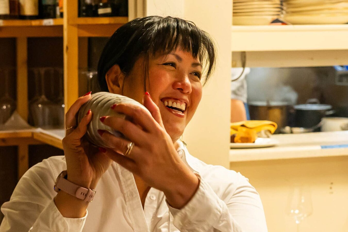 woman shaking a cocktail