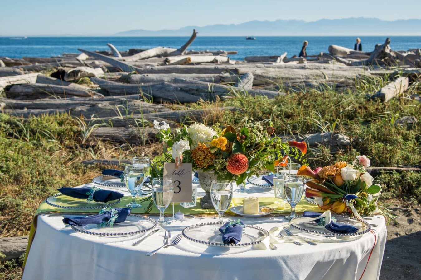 table set for dinner at the beach